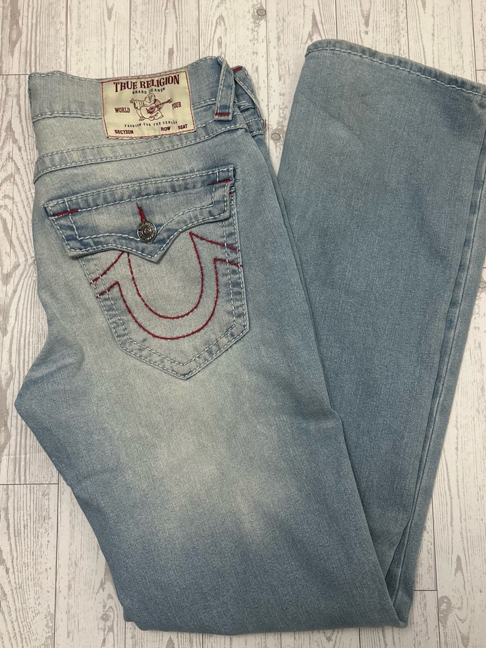 True Religion Men’s Light Blue Bootcut Jeans with Red Pocket Stitch